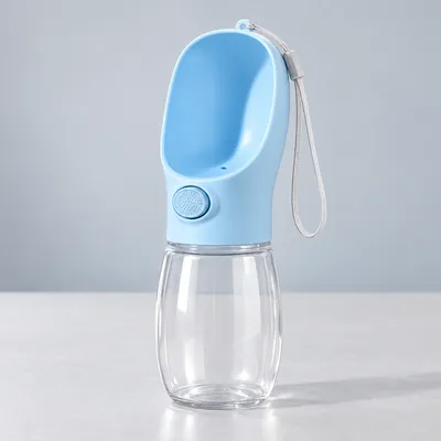 Illustration of a blue portable dog water bottle with a built-in bowl and a wrist strap