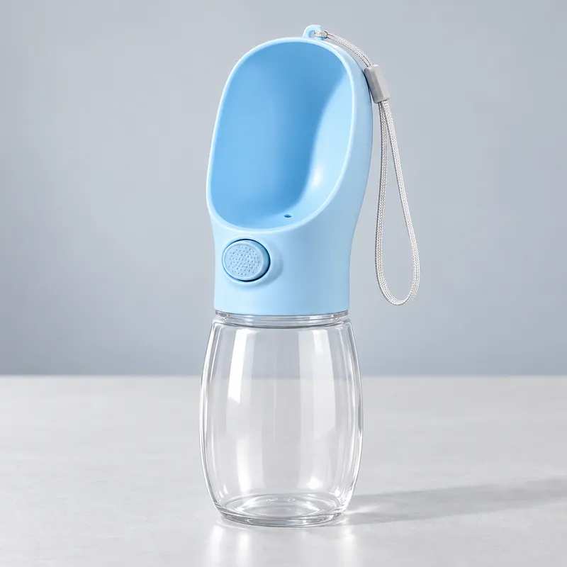 Illustration of a blue portable dog water bottle with a built-in bowl and a wrist strap